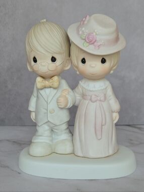 Precious Moments “God Bless Our Family” Figurine